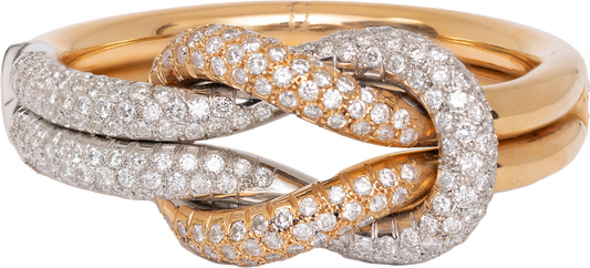 diamond and 18 karat rose and white gold knot cuff bracelet with 18 carats of diamonds