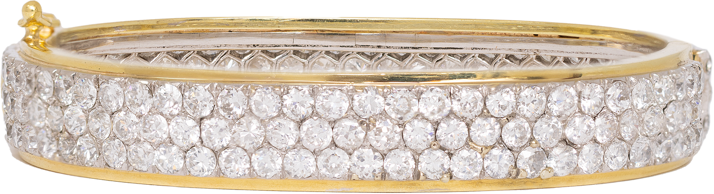 diamond and 18 karat yellow gold bangle bracelet featuring 17 carats of diamonds